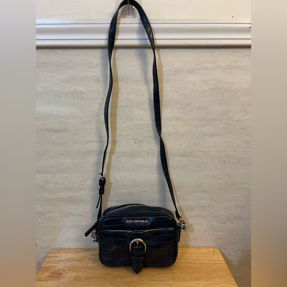Dana Buchman navy blue crossbody purse features a crocodile-embossed pattern